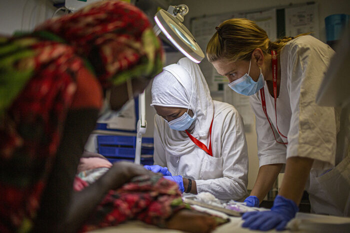 Staff members take blood from a patient in the OPD of the Nyala Paediatric Centre, Sudan.